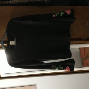 Black crew neck acrylic sweater with embroidered bell sleeves size large